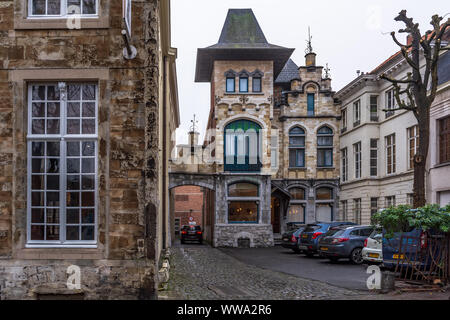 Ghent, Belgium - December 16, 2018: Interesting small narrow medieval house in the Ghent center. Stock Photo