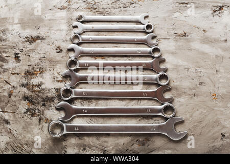 Combination wrenches for car repair on grey table Stock Photo