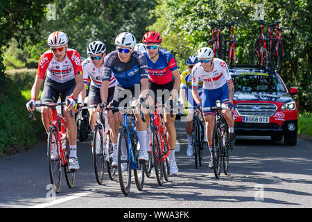 Manchester, UK. 14th Sep, 2019. ; OVO Tour of Britain cycling, stage eight includes almost 2,000 metres of climbing, including the famous climb of the Rake at Ramsbottom, before finishing on the iconic Deansgate in Manchester city centre; Riders bring up the rear of the field - Editorial Use Credit: Action Plus Sports Images/Alamy Live News Stock Photo