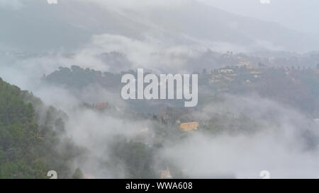 Provence, a village in the fog, beautiful landscape Stock Photo