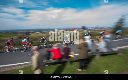 Competitors cycle across the top of Werneth Low Country Park during stage eight of the OVO Energy Tour of Britain from Altrincham to Manchester. Stock Photo