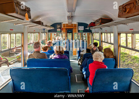 KEITH AND DUFFTOWN RAILWAY MORAY SCOTLAND INSIDE THE TRAIN COMPARTMENT WITH SEATED PASSENGERS Stock Photo