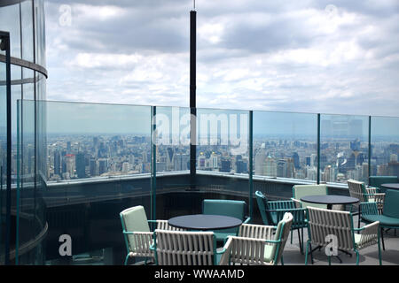 Panoramic skyline view of Bangkok from above from The Peak (314 meters) of the King Power MahaNakhon 78 floors skyscraper Stock Photo