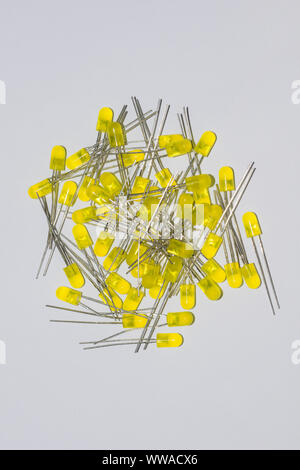 close up image of 5mm yellow leds isolated on white background,pile of 5mm yellow leds. Stock Photo