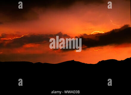 Lightning with dramatic clouds image . Night thunder-storm Stock Photo