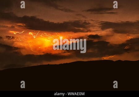 Lightning with dramatic clouds image . Night thunder-storm Stock Photo