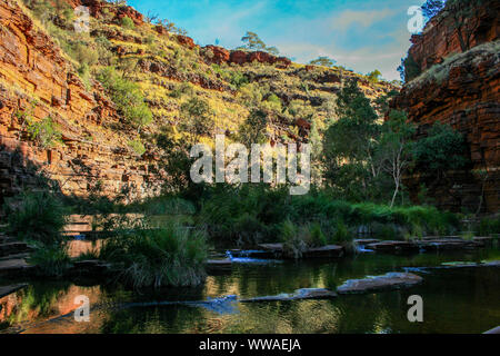 Hiking and swimming in Karijini National-Park, Western Australia with beautiful rock formations Stock Photo