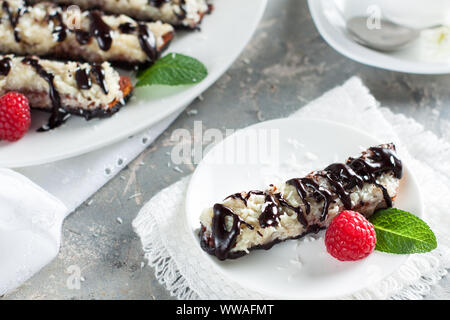 Gluten free cookies biscotti served with berries on grey stone table Stock Photo