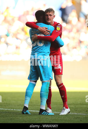 Nottingham Forest's Joe Worrall and Goalkeeper Brice Samba celebrate after Alfa Semedo scores their sides first goal of the match during the Sky Bet Championship match at the Liberty Stadium, Swansea. Stock Photo