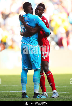 Nottingham Forest's Alfa Semedo celebrates with Goalkeeper Brice Samba at full time during the Sky Bet Championship match at the Liberty Stadium, Swansea. Stock Photo