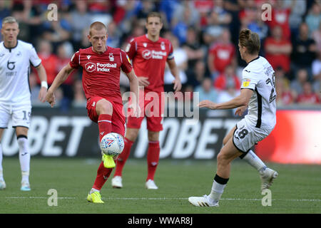 Swansea, Wales, UK. 14th Sep, 2019.  Ben Watson of Nottingham Forest about to be challenged by George Byers of Swansea City during the Sky Bet Championship match between Swansea City and Nottingham Forest at the Liberty Stadium, Swansea on Saturday 14th September 2019. (Credit: Jeff Thomas | MI News) Editorial use only, license required for commercial use. Photograph may only be used for newspaper and/or magazine editorial purposes Credit: MI News & Sport /Alamy Live News Stock Photo