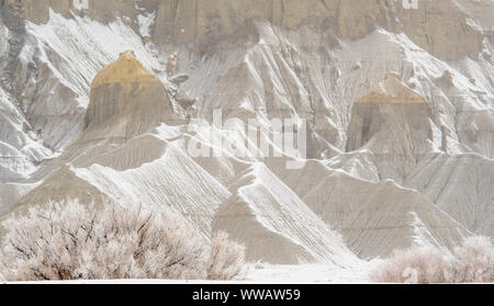 Fresh snow on eroded buttes, Caineville, Utah, USA Stock Photo