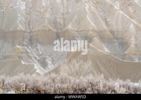 Fresh snow on eroded buttes, Caineville, Utah, USA Stock Photo