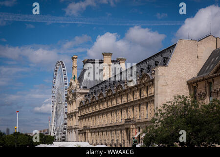 European vacation and sightseeing in Paris near the Louvre and the Roue de Paris Stock Photo