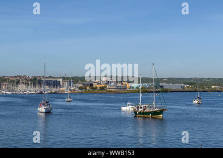 Yachts moored in Cardiff Bay awaiting the opening of the Bay Barrage lock gates Stock Photo