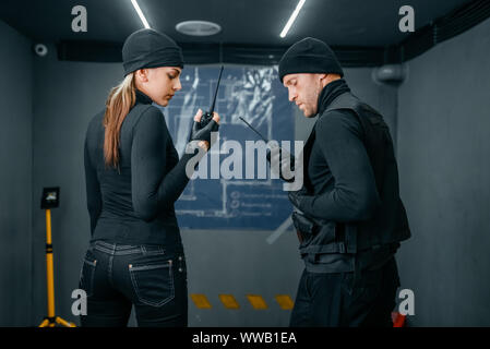 Bank robbery, robbers working on a plan Stock Photo