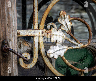 door handle decorated with wrought iron flowers Stock Photo