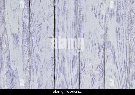 Wooden background texture. Creatively painted white and purple boards. Stock Photo
