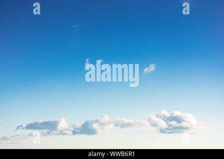 beautiful cloudscape in evening light. fluffy clouds on the blue sky Stock Photo