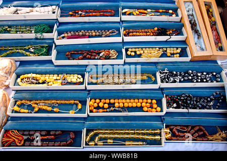 Worry beads (in greek 'komboloi', plural 'kombologia') for sale at the Flea market in Monastiraki, Athens, Greece. Stock Photo