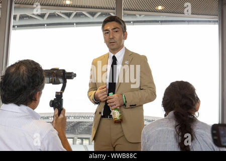 Miyagi, Japan. 14th Sep, 2019. Yutaka Kumagai, Rifu Town Mayor speaks with a group of foreign journalists at Miyagi Stadium. The stadium located in the town of Rifu was damaged by the 2011 Great East Japan Earthquake. A media tour organized by the Tokyo Metropolitan Government in collaboration with local authorities aims to showcase the recovery efforts in Tohoku area affected by the 2011 Great East Japan Earthquake and Tsunami. The stadium is the biggest stadium in the Tohoku area with a capacity of 49,000 people and will host the Tokyo 2020 football games. (Credit Image: © Rodrigo Reyes Stock Photo