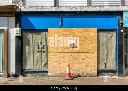 Closed and shuttered shop in Kings Lynn, Norfolk. King's Lynn is one of the towns eligible for support from new government Towns Fund. Stock Photo
