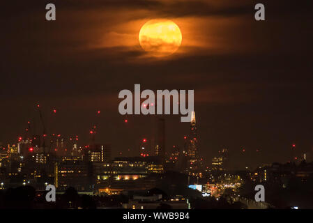 The Harvest Moon rises over 14,345 foot, Blanca Peak, south of the sand ...