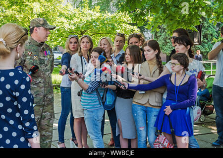 Dnipro, Ukraine - May 25, 2016: Speaking is given by a tankman with the call sign “Gnome” (93 OMBr) Ivan Nachovny - head of All-Ukrainian Union of ATO Stock Photo