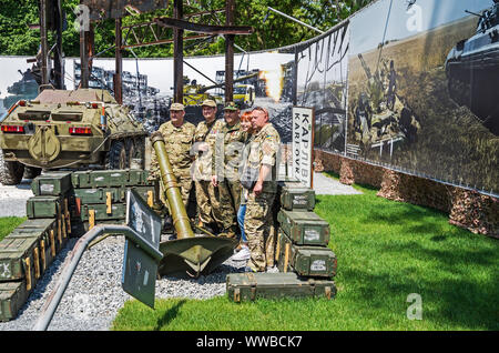 Dnipro, Ukraine - May 25, 2016: Combatant soldiers, sergeants and officers, Ukrainian veterans on the opening day of museum Russian-Ukrainian war in D Stock Photo