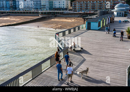 HASTINGS, UNITED KINGDOM - JULY 29: Hastings pier along the seaside area, a popular tourist destination in the summer time on July 29, 2019 in Hasting Stock Photo