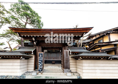 Takayama, Japan - April 7, 2019: Entrance gate with sign to Eiho-ji Buddhist Zen Rinzai Buddhism temple shrine with wooden traditional Japanese archit Stock Photo