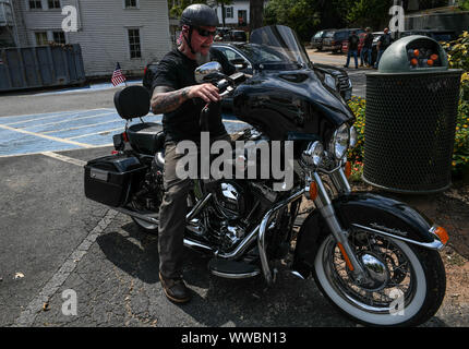 Dahlonega, Georgia, USA. 14th Sep, 2019. CHESTER DOLES, a longtime white nationalist leader, leaves riding his Harley Davidson bike at the end of what he billed as an 'American Patriot Rally'' to honor President Trump in Dahlonega, Georgia on Saturday. Doles said the event was 'not a so-called white nationalist rally'' and that 'anyone'' was welcome to attend. Credit: Miguel Juarez Lugo/ZUMA Wire/Alamy Live News Stock Photo