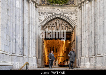 New York City, NY, USA - December, 25th, 2018 - Detail of opened door at St. Patrick's Cathedral Christmas Day Mass with Cardinal Timothy Michael Dola Stock Photo