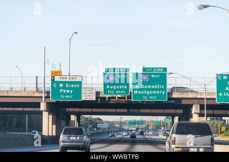 Atlanta, USA - April 21, 2018: Road exit sign on interstate highway 85 to Atlanta internation airport, domestic flights with cars driving in Georgia c Stock Photo