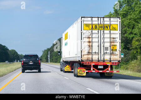 Fitzpatrick, Alabama - April 21, 2018: Cars and JB Hunt cargo transportation truck on interstate highway 85 i-85 road in Alabama Stock Photo