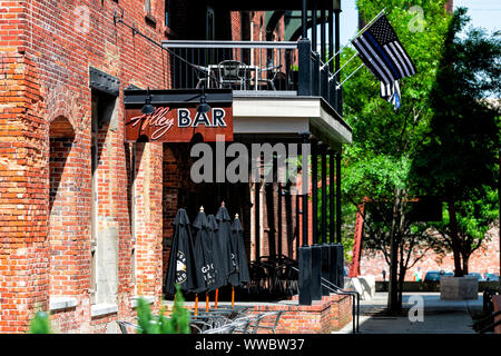 Montgomery, USA Brick buildings on Alley street alleyway during day in ...