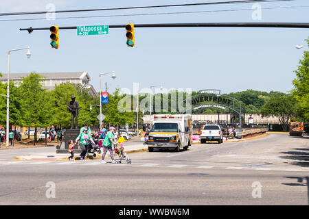 Montgomery, USA - April 21, 2018: Riverfront park buildings on road street during day in capital Alabama city in downtown old town, Tallapoosa sign Stock Photo