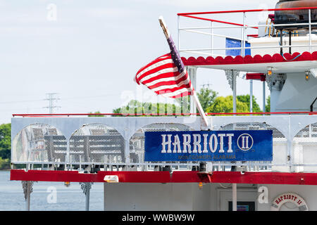 Montgomery, USA - April 21, 2018: Exterior state of Alabama ferry cruise ship Harriott sign with old historic architecture and American flag Stock Photo