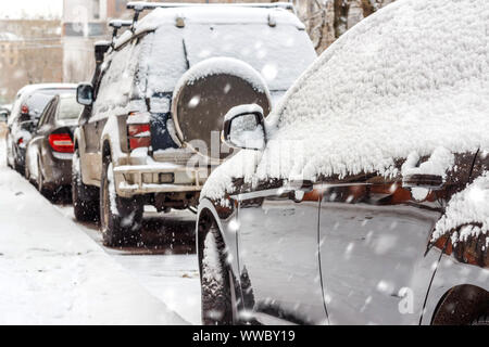 Snow on cars after snowfall Stock Photo