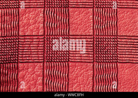 Texture of genuine geometric plaid leather close-up, red color. For background, copy space Stock Photo