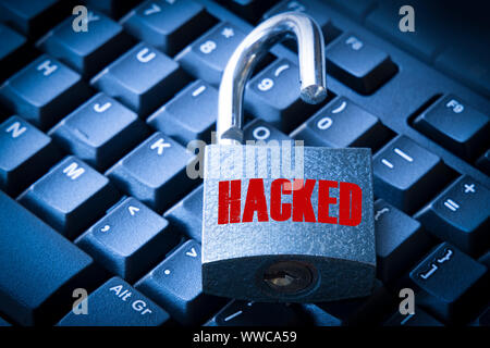 Cyber security concept open padlock on the computer keyboard. Stock Photo