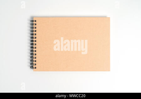A notebook on a spring. Isolated on white background. Stock Photo