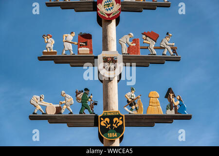 Pole with coat of arms in Traunsten, Bavaria, Germany Stock Photo