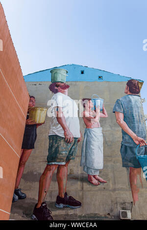 ISTANBUL, TURKEY - JUNE 17, 2019: Pray for Rain mural in Istanbul, Turkey. Mural was made by Australian street artist Fintan Magee for Mural Istanbul Stock Photo