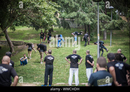 ISTANBUL, TURKEY - Maj 30 - Jun 02. 2019. Large group of international martial arts instructors and students have hard strength energy training on GEN Stock Photo