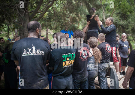 ISTANBUL, TURKEY - Maj 30 - Jun 02. 2019. Large group of international martial arts instructors and students have hard strength energy training on GEN Stock Photo