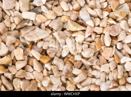 Close up of sea pebbles background. Can be used as texture in art or design projects. Stock Photo