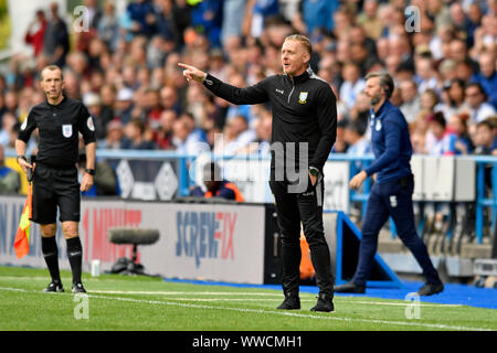 Huddersfield, UK. 15th Sep, 2019. Huddersfield, UK. 15 September 2019. The John Smiths Stadium, Huddersfield, Yorkshire, England; English Championship Football, Huddersfield Town Football Club versus Sheffield Wednesday; Sheffield Wednesday Manager Gary Monk gives instructions to his players from the bench as they take the lead - Strictly Editorial Use Only. No use with unauthorized audio, video, data, fixture lists, club/league logos or 'live' services. Online in-match use limited to 120 images, no video emulation. No use in betting, games or single club/league/player publications Credit: Act Stock Photo