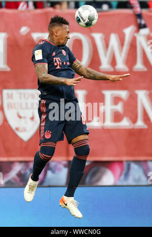 Leipzig, Germany. 14th Sep, 2019. Soccer: Bundesliga, Matchday 4, RB Leipzig - Bayern Munich in the Red Bull Arena Leipzig. Player Jerome Boateng of Bavaria at the header. Credit: Jan Woitas/dpa-Zentralbild/dpa - IMPORTANT NOTE: In accordance with the requirements of the DFL Deutsche Fußball Liga or the DFB Deutscher Fußball-Bund, it is prohibited to use or have used photographs taken in the stadium and/or the match in the form of sequence images and/or video-like photo sequences./dpa/Alamy Live News Stock Photo