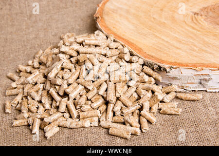 Wood pellets close up .Wooden pellet bio fuel. Biomass Pellets - cheap  energy. The cat litter Stock Photo - Alamy